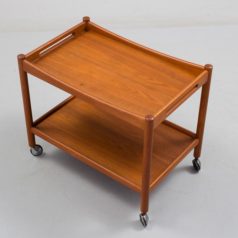 A Hans J Wegner serving trolley veneered with teak.