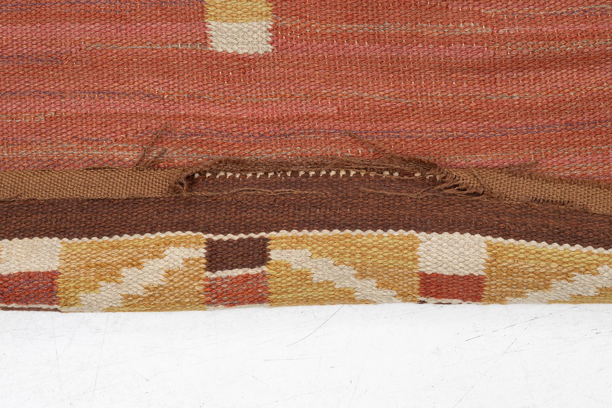 A flat weave carpet, c. 360 x 265 cm.