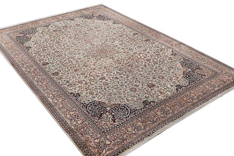 A carpet, silk Kashmir, c. 358 x 252 cm.