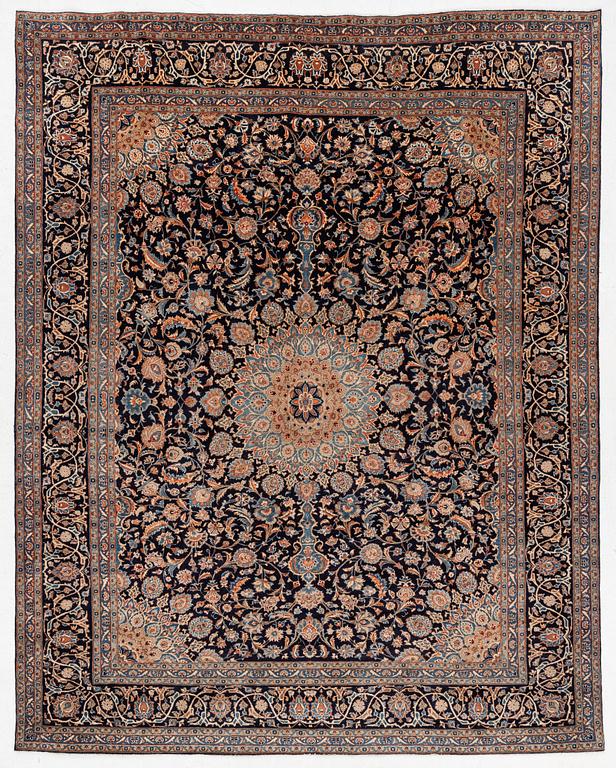 A Keshan rug, approx. 370 x 297 cm.