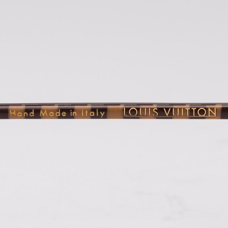 SOLGLASÖGON, Louis Vuitton.