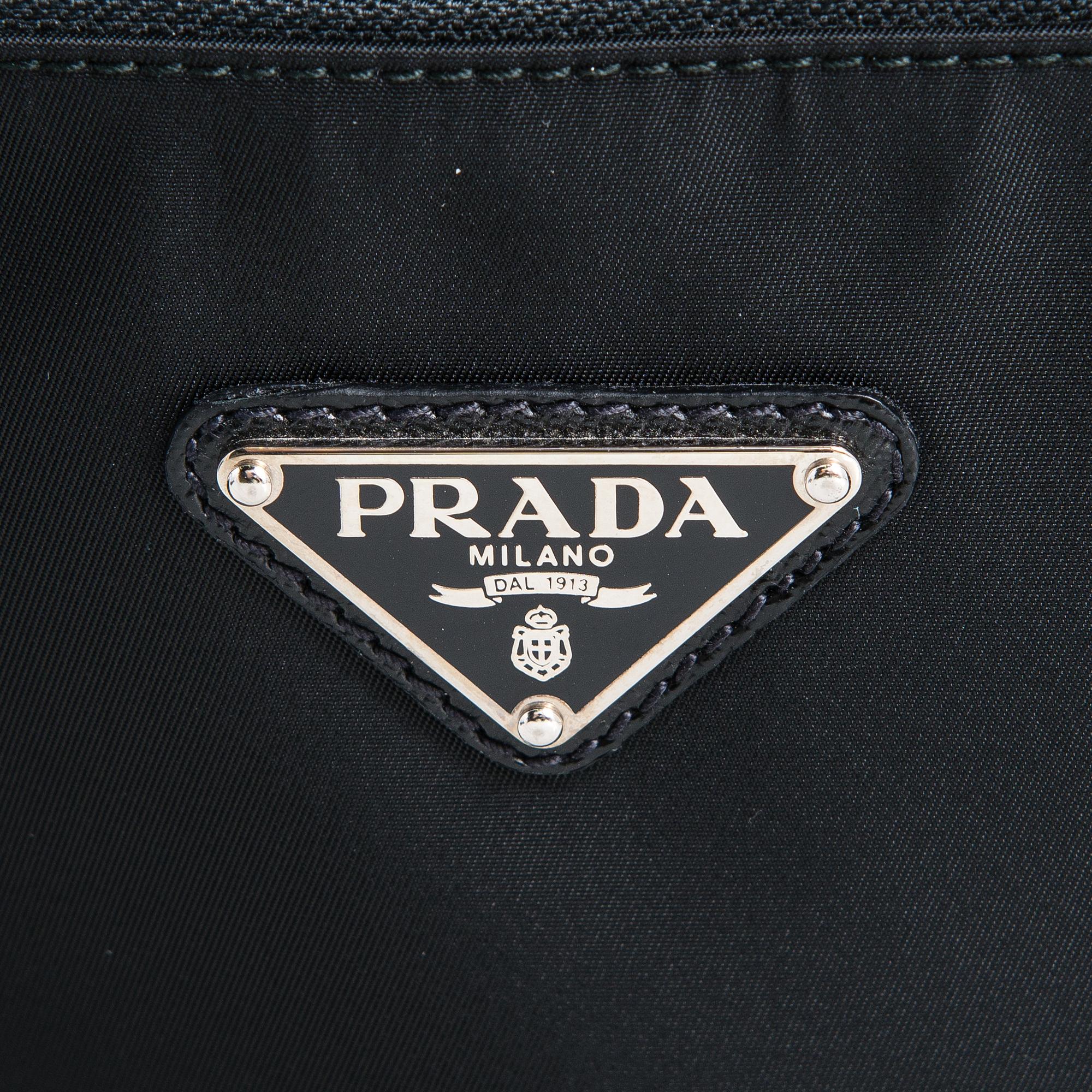 Prada, suitcase.