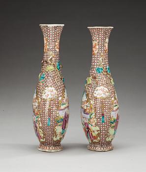 A pair of famille rose vases, Qing dynasty, Qianlong (1736-95).