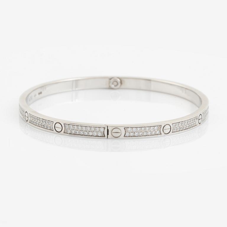 Cartier "Love" armband liten modell 18K vitguld med runda briljantslipade diamanter.