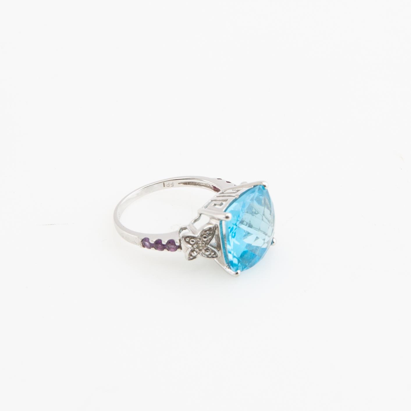 Ring, 14K gold with topaz, diamonds, and purple garnets.