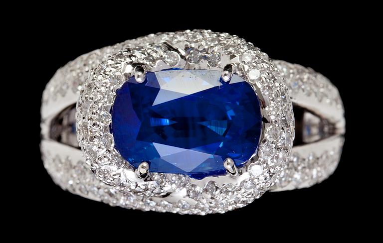 A blue sapphire, 5.05 cts, and diamond ring.