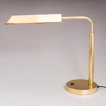 A pair of second half of the 20th century brass table lamps.