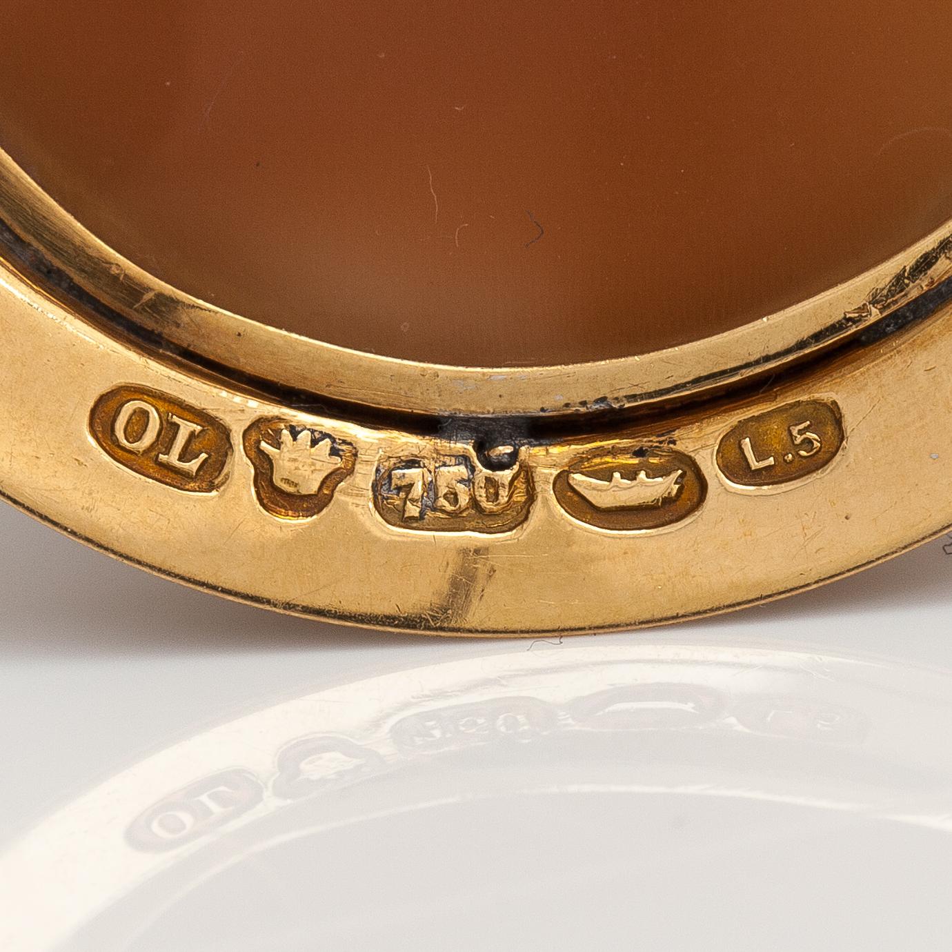 An 18K gold and cameo brooch. Oskar Lindroos, Helsinki 1916.