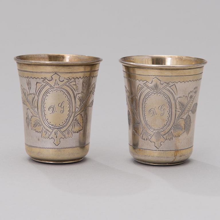 A pair of Russian, partially gilt  silver beakers, master mark of Iщ, Moscow 1880s.