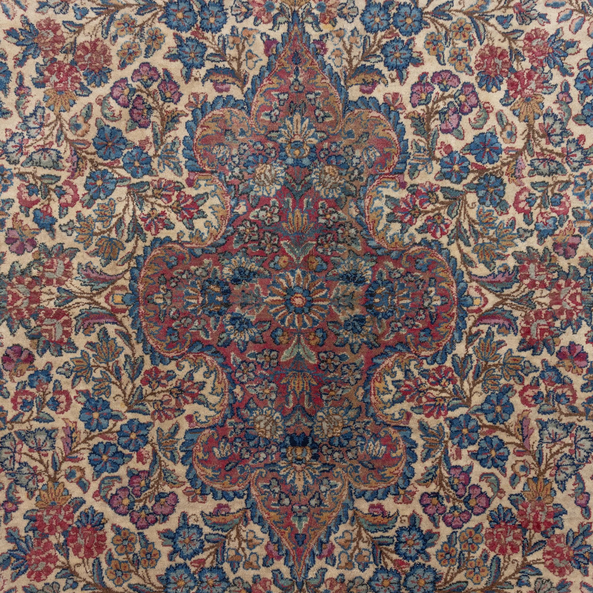 A semi-antique Kerman carpet, c. 273 x 172 cm.