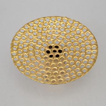 a brass vase by Pierre Forsell for Skultuna.