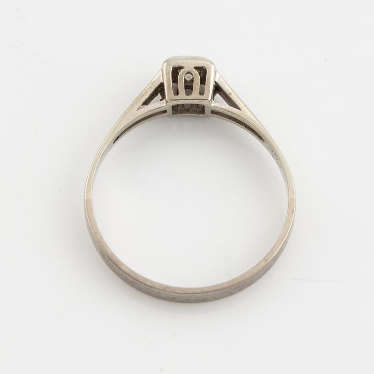 White gold and brilliant cut diamond ring.