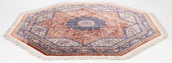 An Oktagonal  silk Qum rug, Central Persia, signed, c. 250 x 250 cm.