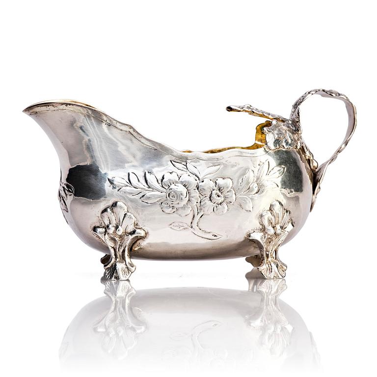 A Swedish mid- 18th century parcel-gilt silver cream-jug, mark of Anders Schotte, Uddevalla 1776.