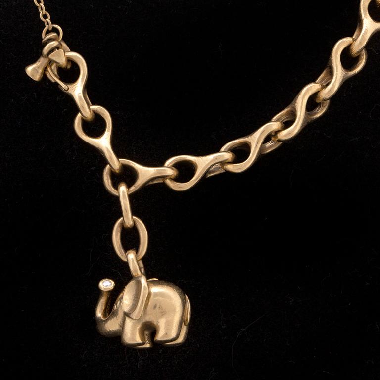 Lynggaard, bracelet 18K gold 1 elephnat charm w 1 brilliant-cut diamond, approx 18 cm.