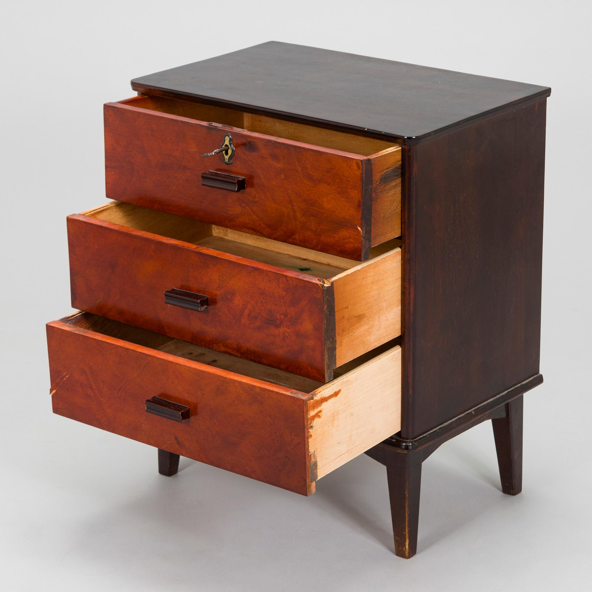 A 1930s functionalist style chest of drawer.