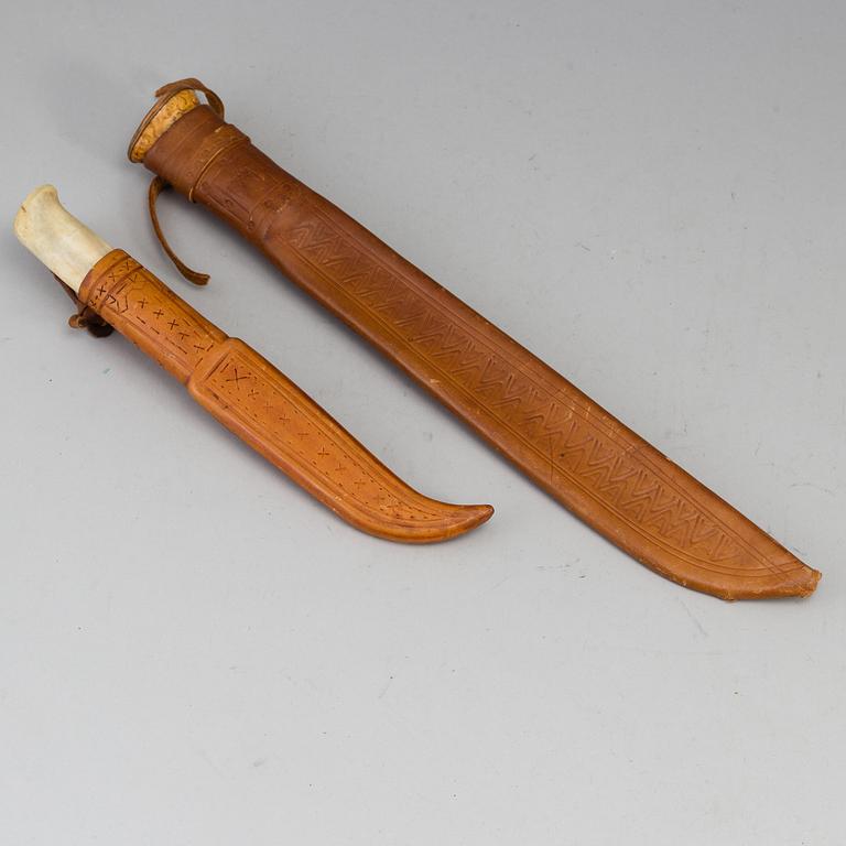 Two Sami knives, one Janne Marttiini.