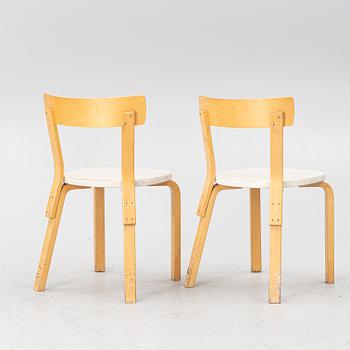 Alvar Aalto, a pair of model 69 chairs, Finland, second half of the 20th century.
