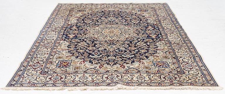 A Nain carpet, part silk, c 305 x 206 cm.