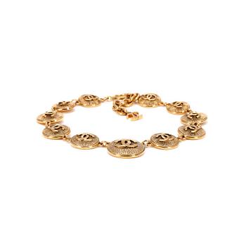 477. CHANEL, a gold colored medallion CC necklace.
