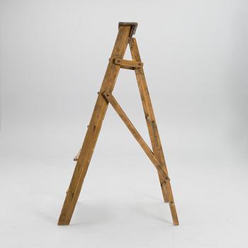 A mid-20th century ladder.