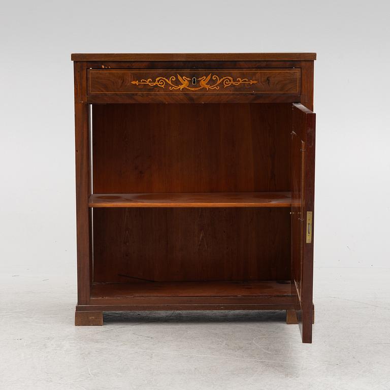 A late Empire cabinet, mid 19th Century.