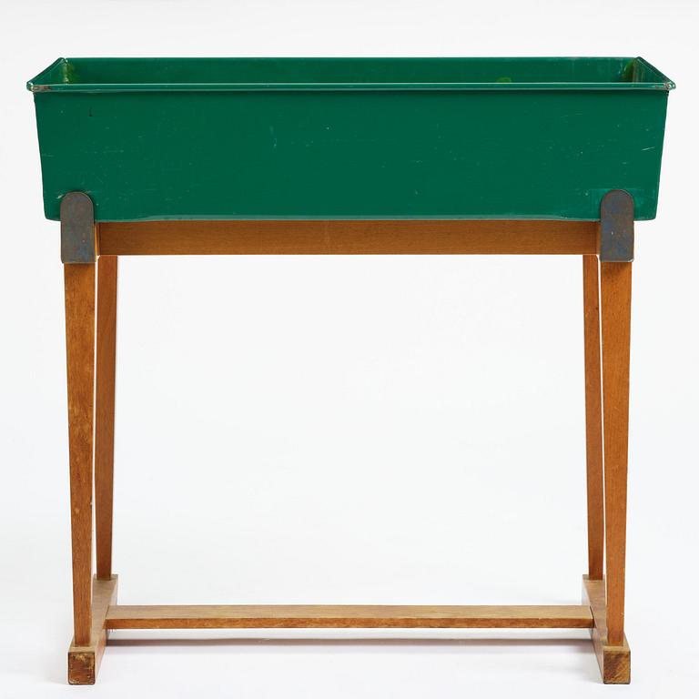 Josef Frank, a rare flower table with green lacquered box model "B 2084", Firma Svenskt Tenn, Sweden, 1950-60s.
