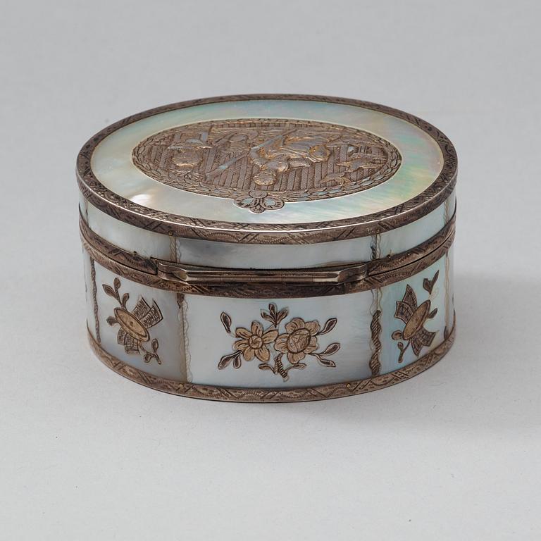 A French 18th century mother of pearl,tortoiseshell and silver snuff-box, marked Paris 1769.