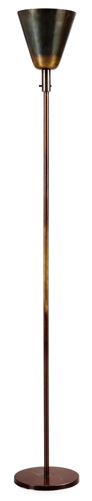 A 1930's-50's patinated metal floor lamp.