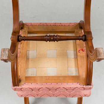 A pair of walnut stools by A. Svensson & Sons Göteborg c. 1900.