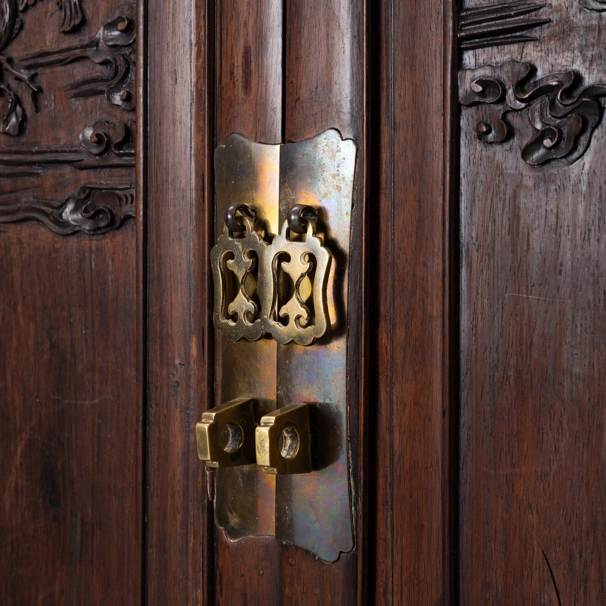 A hardwood cabinet, China, 20th century.