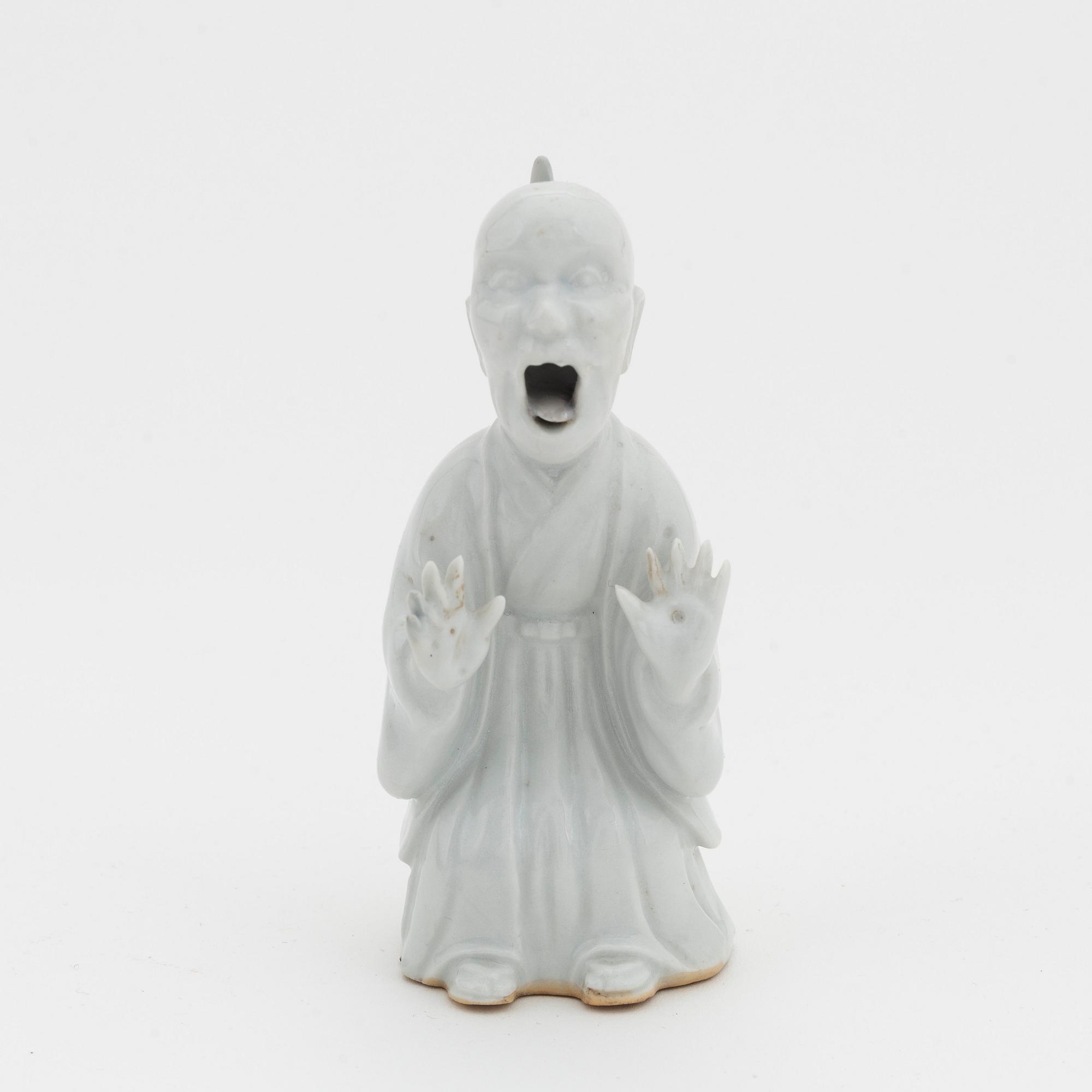 A Japanese comedy figure, around 1900.