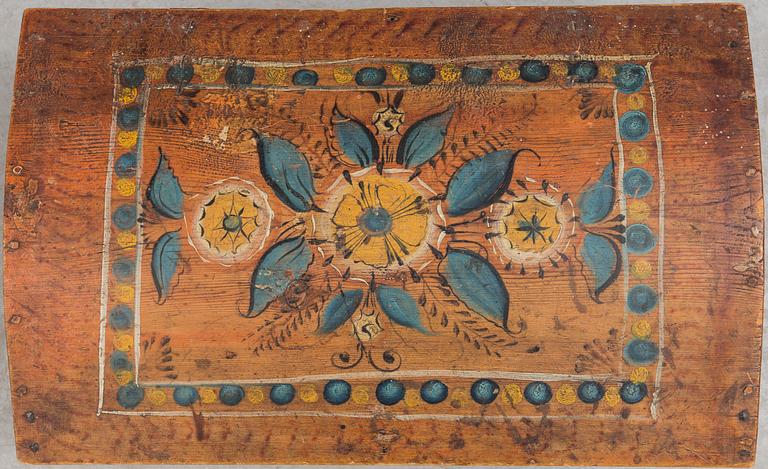 A wooden chest, dated 1856.