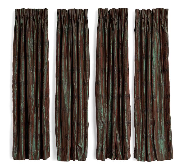 A set of four green silk curtains.