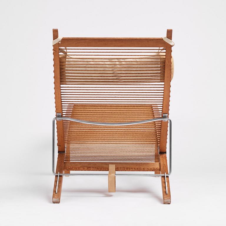 Hans J. Wegner, an oak lounge chair model "JH 524", Johannes Hansen, Copenhagen.