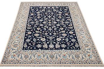 A part silk Nain rug, 9LA, c. 302 x 198 cm.
