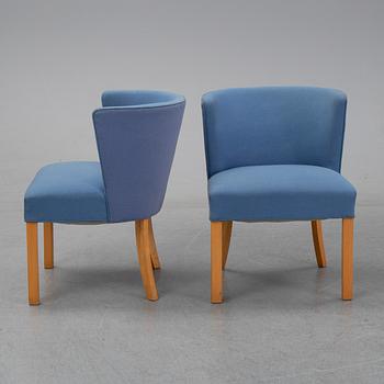 Fritz Henningsen, a pair of beech easy chairs, Fritz Hansen, Denmark.