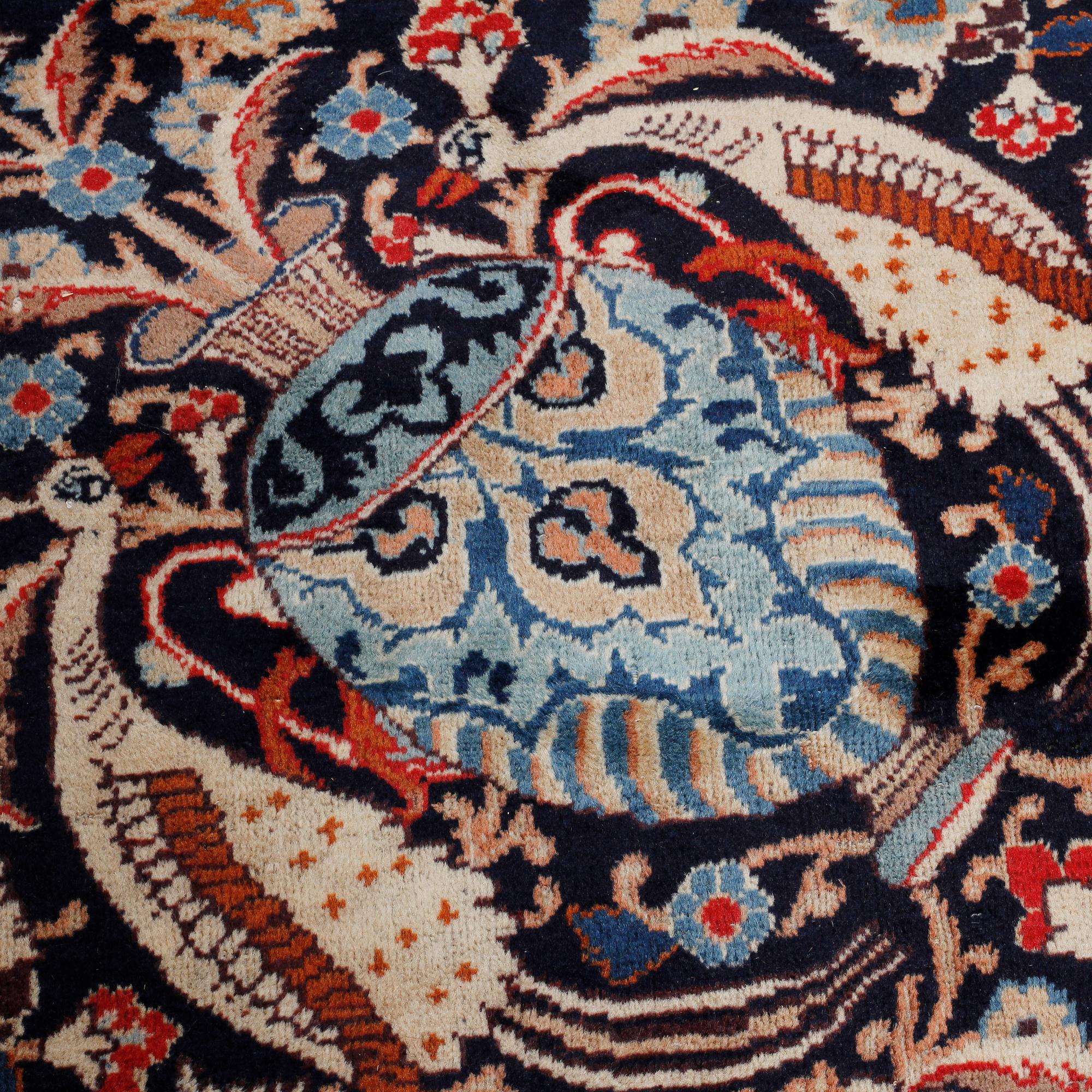A KASHMAR RUG, 392 x 297 cm.