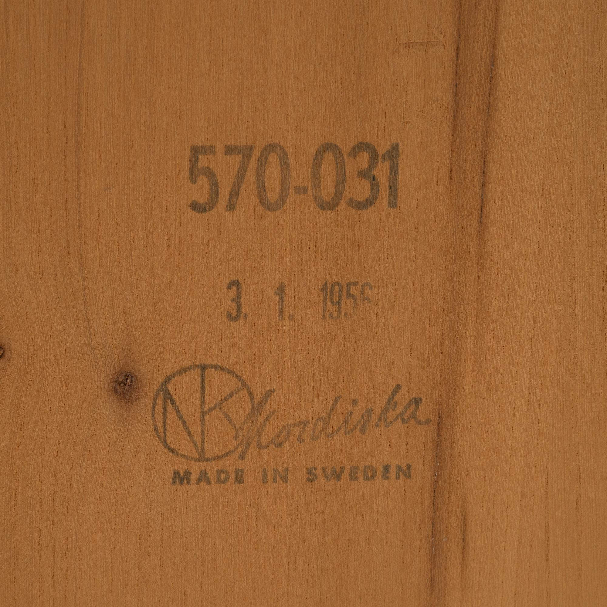 A gate-legged table by Nordiska Kompaniet 1956.