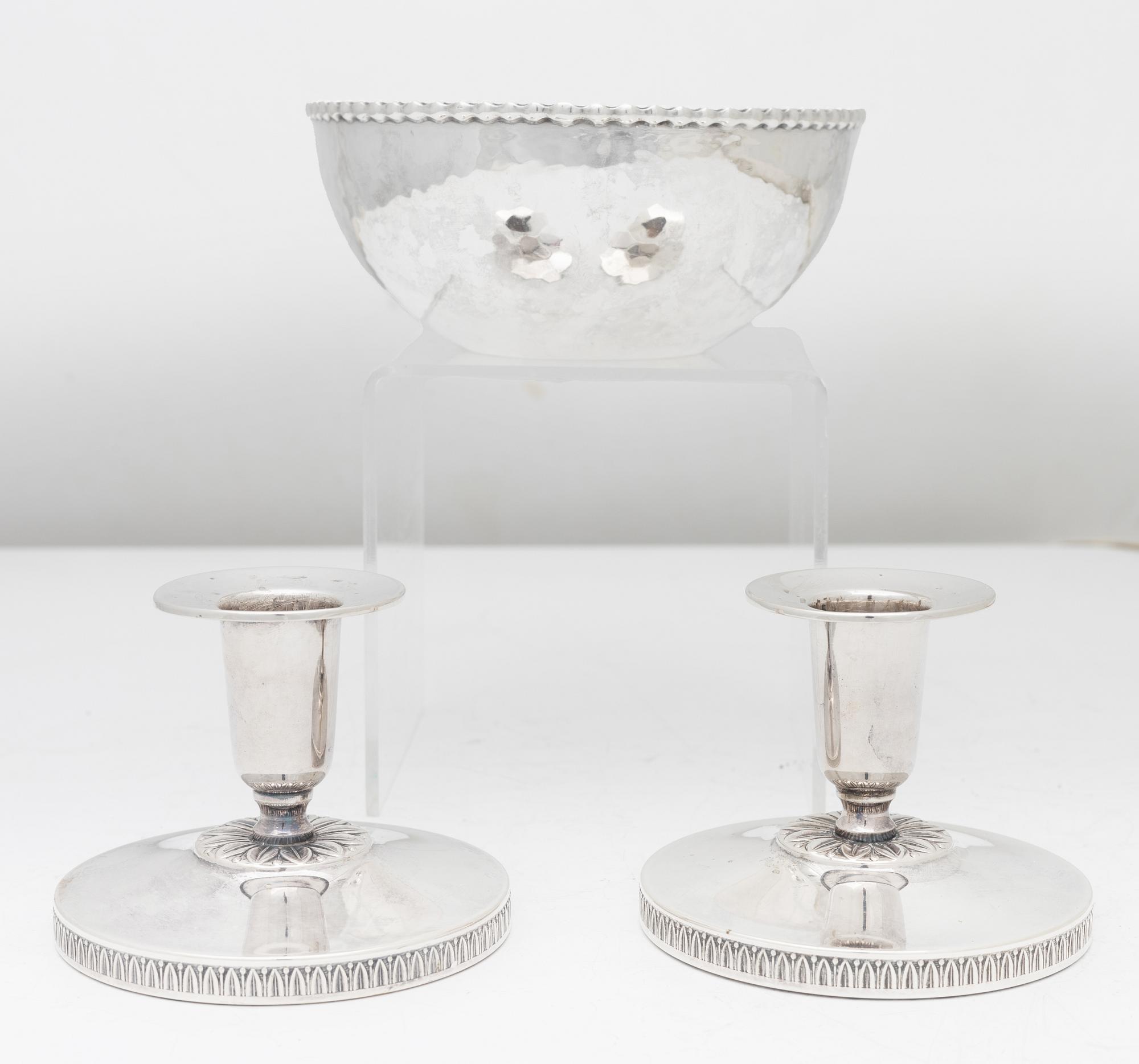 A pair of Swedish silver candlesticks, and a bowl, 1930s–60s.