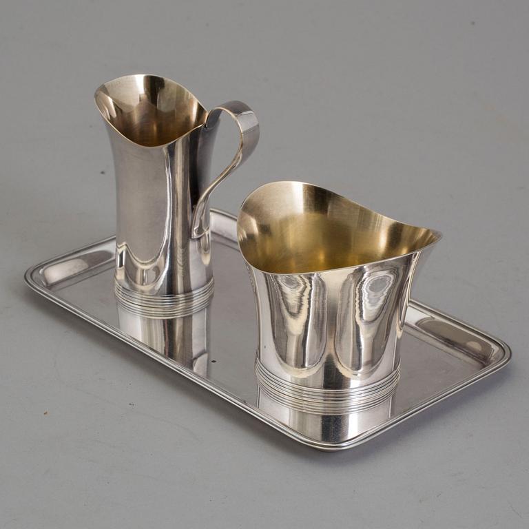 GAB, a silver creamer and sugarbowl with tray, Stockholm, 1961.