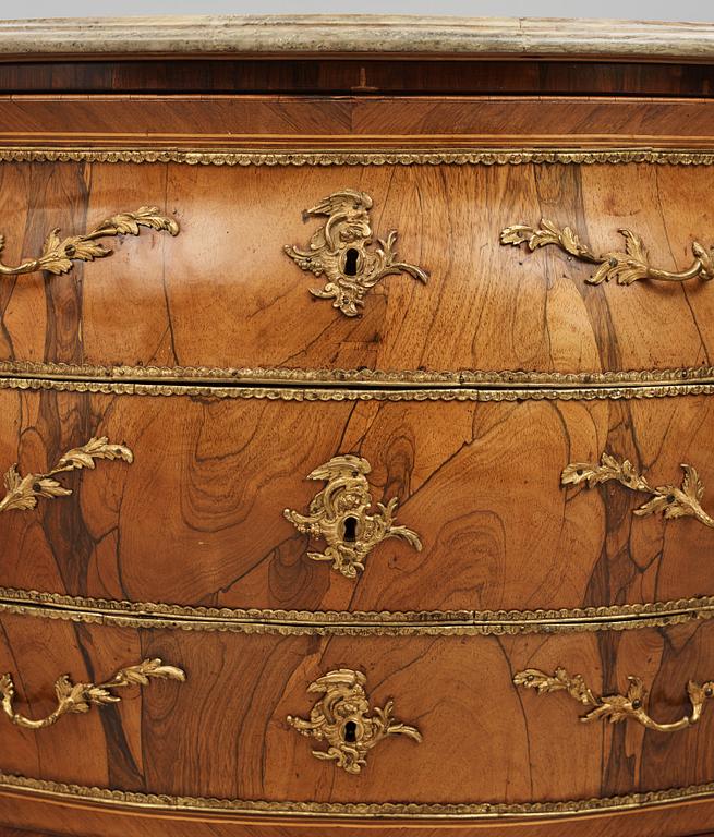 A rococo ormolu-mounted and parquetry commode attributed to C. G. Willkom (master in Stockholm 1763-65).