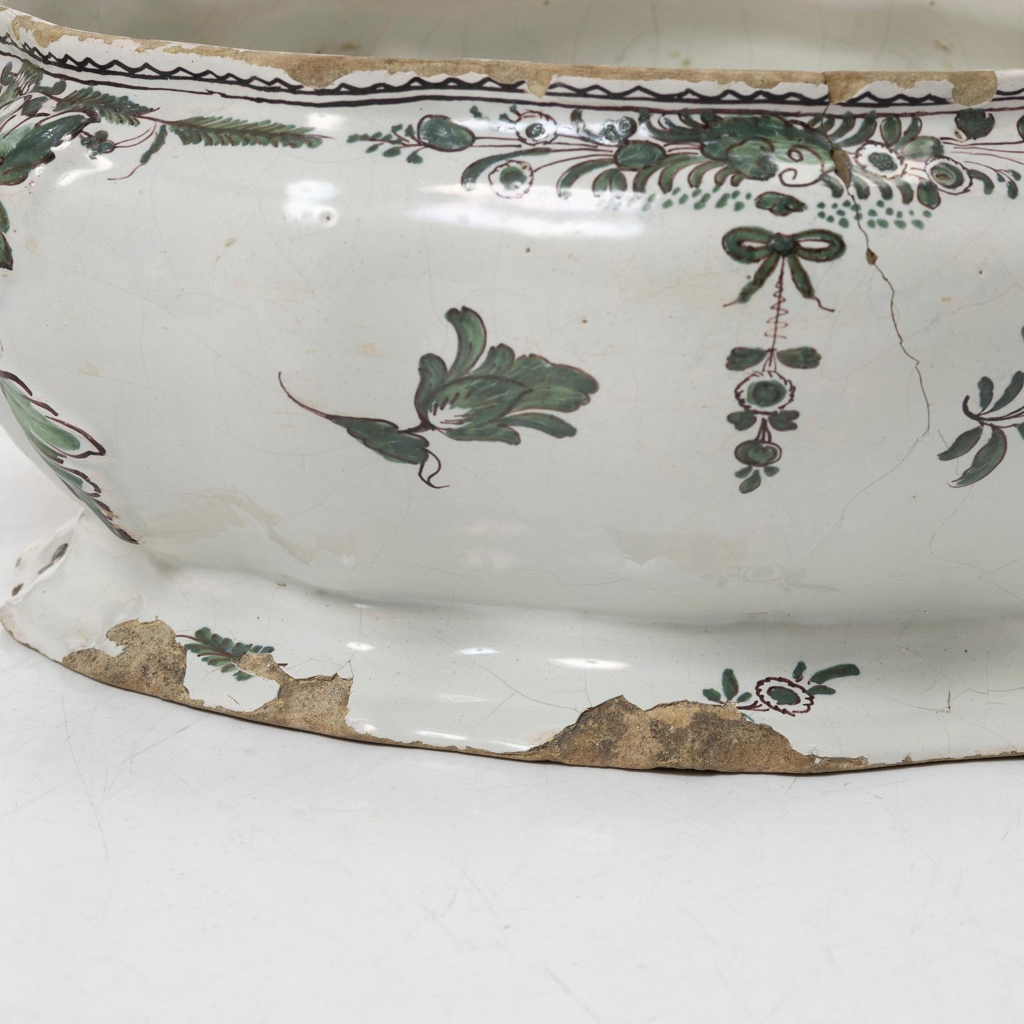 A faience lidded turrine, France, 18th/19th century.