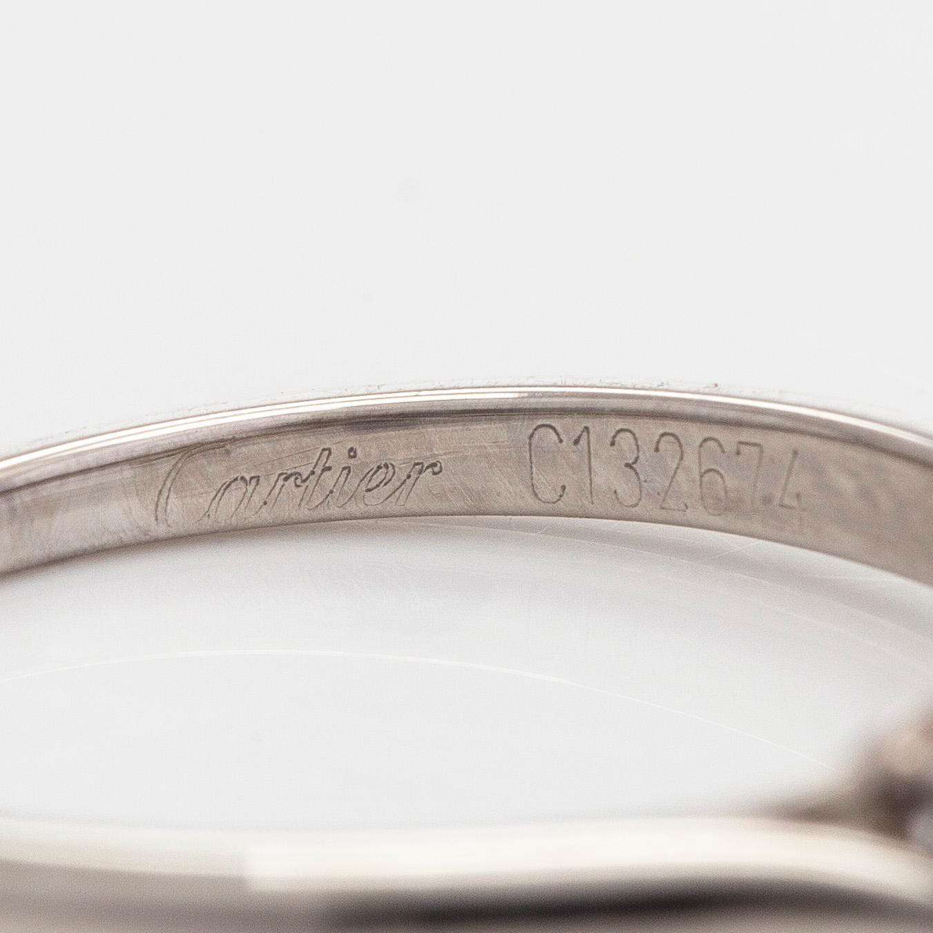 Cartier, ring, platina med briljantslipad diamant ca 0.46 ct. Med GIA dossier.