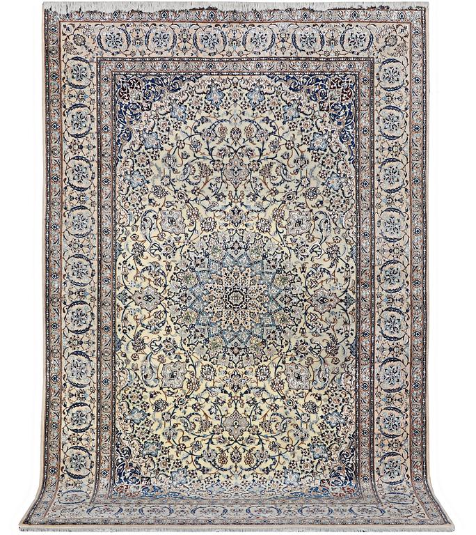 A Nain carpet, part silk, 6 laa, c. 283 x 180 cm.