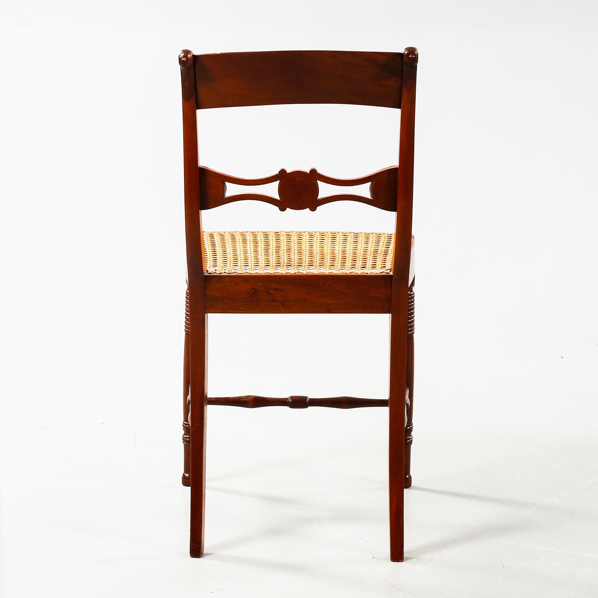 Nine chairs, made by Nils Tohrsson in Lindome (1779 - 1848) in the first half of the 19th century.