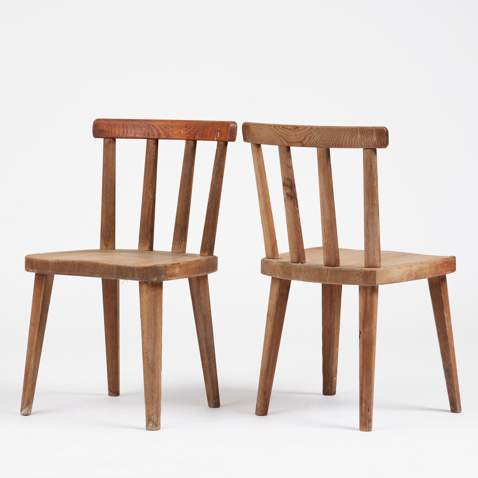 Axel Einar Hjorth, a set of four stained pine "Utö" chairs, Nordiska Kompaniet, Sweden, 1930s.