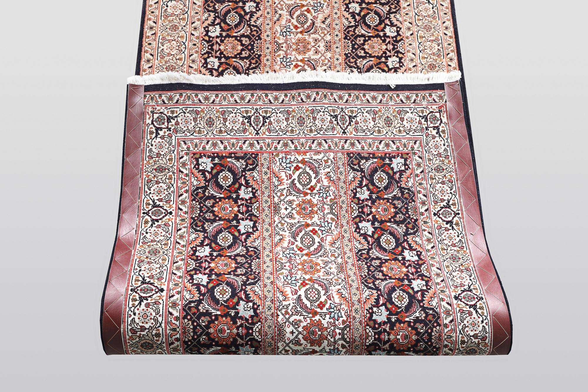 A runner, Täbris, part silk, ca 297 x 81 cm.