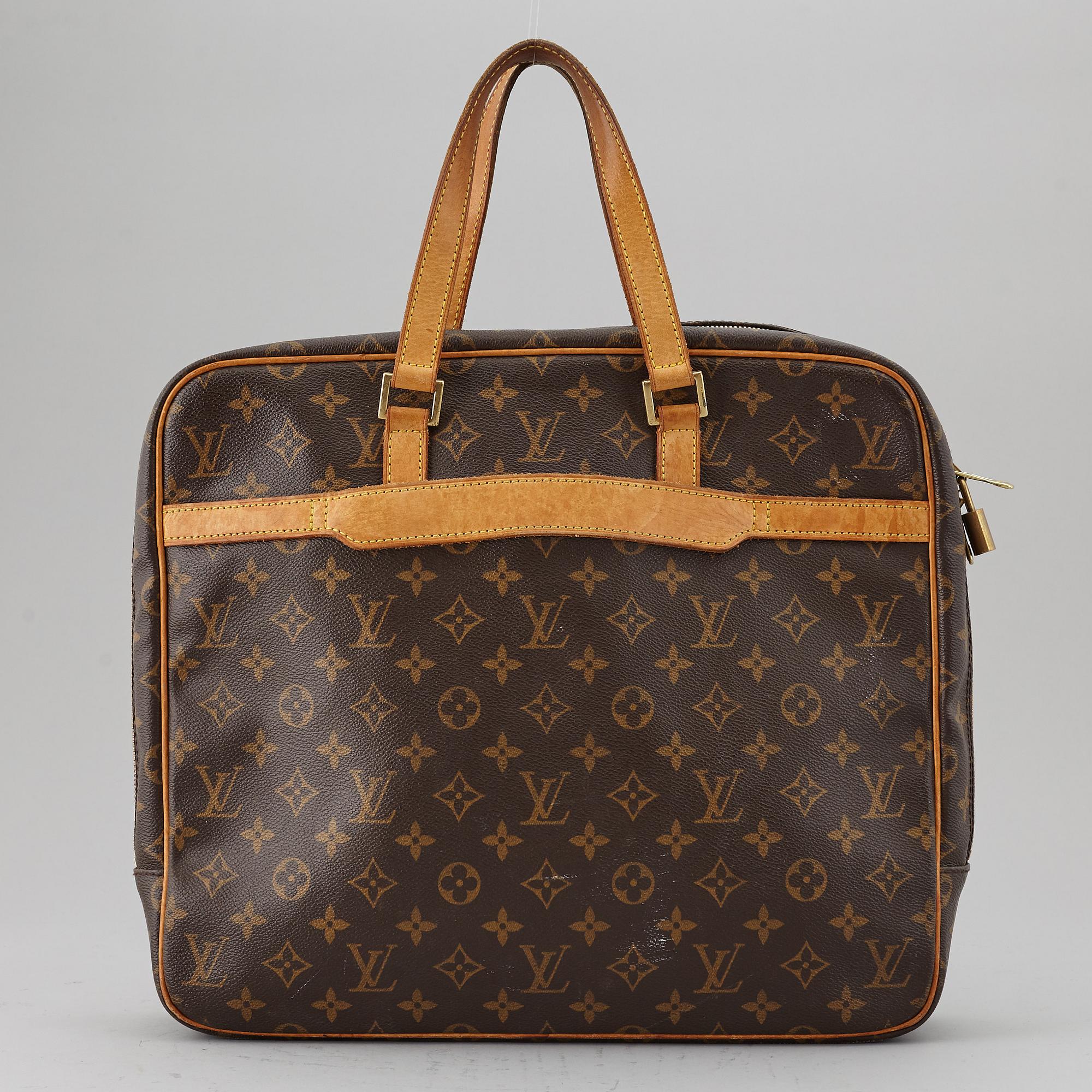 LOUIS VUITTON a Porto Pegasu laptop bag. Bukowskis
