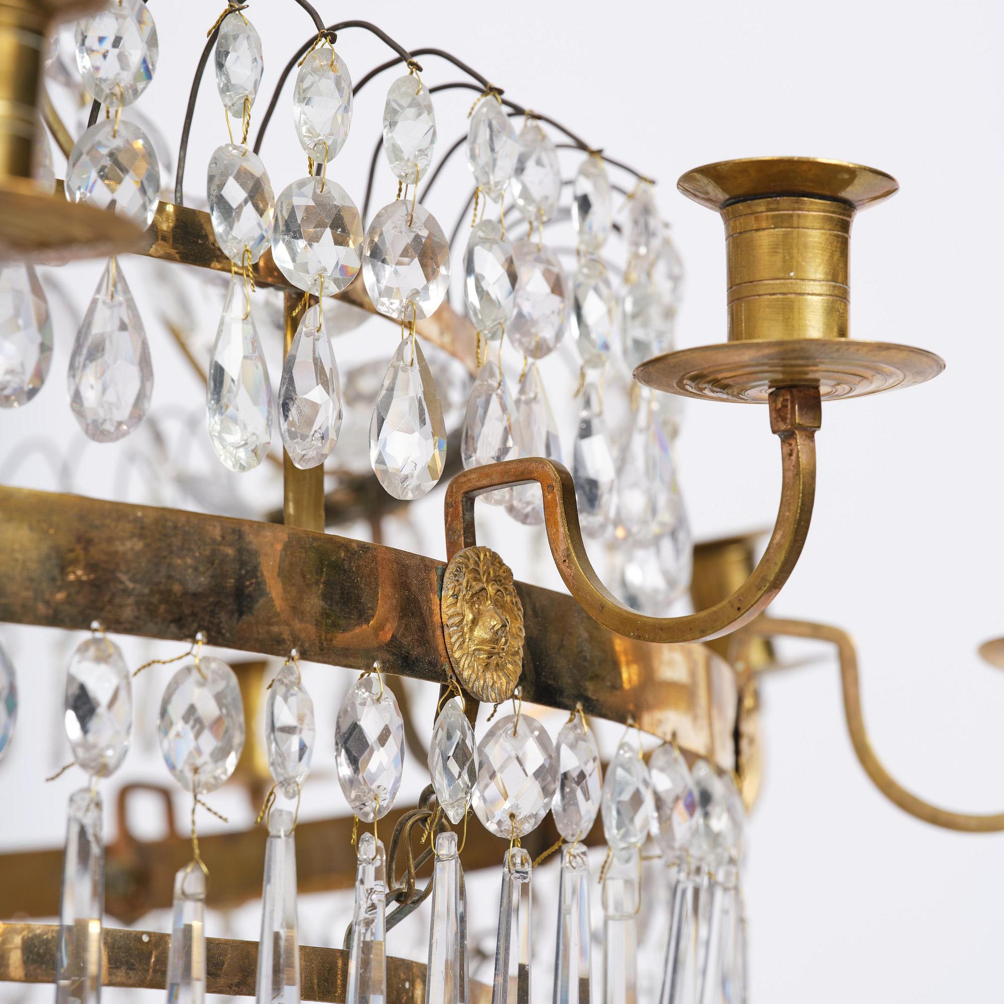 A late Gustavian thirteen-light gilt brass and cut glass chandelier, Stockholm, late 18th century.